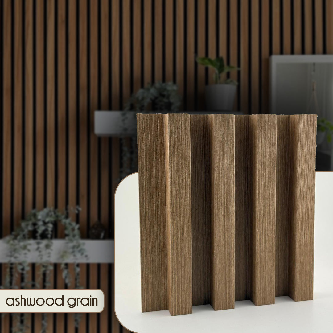 Wooden panel with ashwood grain texture on a white surface with a blurred background