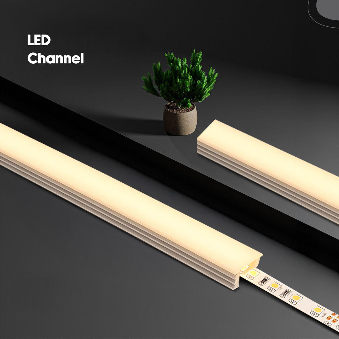 LED strip lights on a dark surface with a plant in the background, led channel, wpc accessories