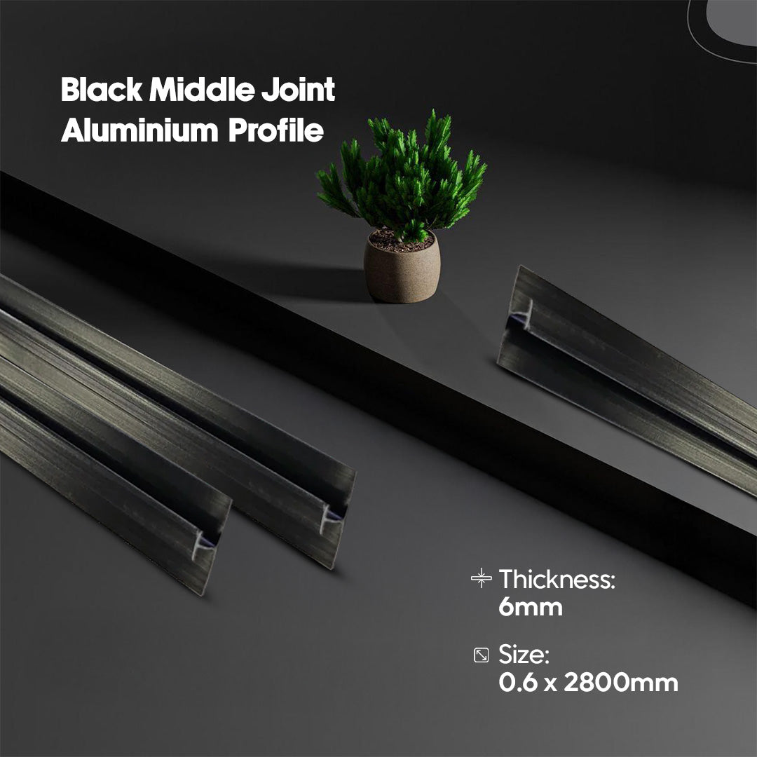 Black middle joint aluminium profile with a plant on a dark surface
