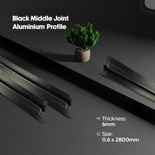 Black middle joint aluminium profile with a plant on a dark surface